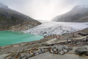 Fototapete Rund Great Rhone glacier melting water lake in canton of Valais, Switzerland. © Fominayaphoto