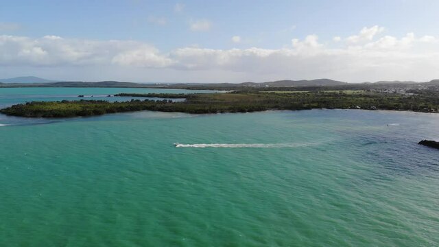 boat leaving the island