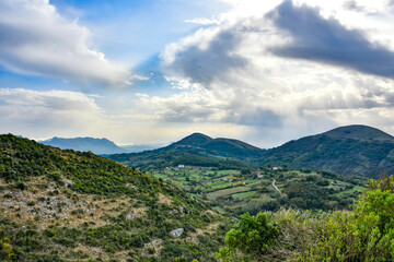 Fototapeta na wymiar A valley seen from Castel di Sasso, a small village in the mountains of the province of Caserta, Italy.