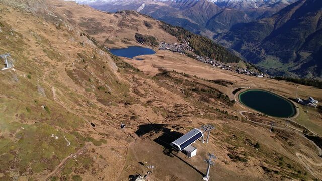 Following a gondola ride in stunning autumn mountain scenery in Switzerland