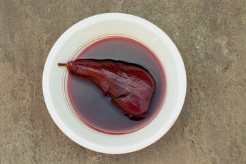 close-up of a dish of poached pear