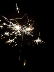 Sparklers burning brightly on bonfire night