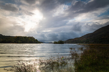Fototapeta premium A calm autumnal 3 shot HDR image of approaching rain at Loch Awe taken from Kilchurn Castle, Argyll and Bute, Scotland