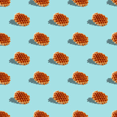 waffles with shadow on blue background seamless pattern