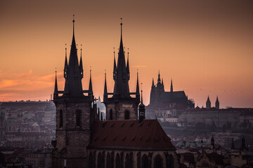 Sunset panorama of Prague Tyn Church Old Town and Prague Castle, evening panorama, towers, travel to Prague