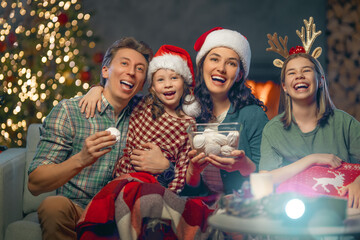 family watching holiday movies at home