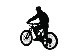Obraz na płótnie Canvas silhouette of a person riding a bicycle