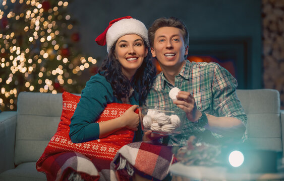 Couple Watching Holiday Movies At Home