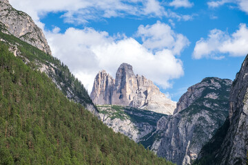 Beautiful sunny day in Dolomites mountains. View on Tre Cime di Lavaredo - three famous mountain peaks Unesco