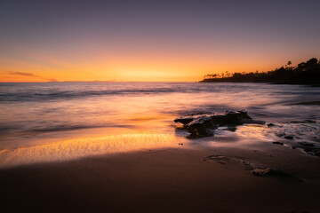 Sunset on Malibu beach in California