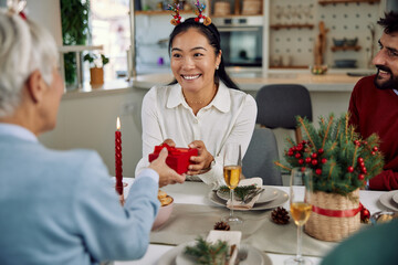 a cheerful family sharing love and surprises on Christmas