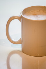 Hot chocolate and hot coffee in a mug 