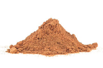 Pile of cinnamon powder isolated on a white background