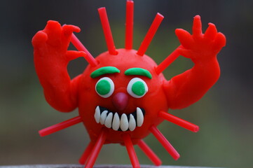 The virus is trying to scare. A symbolic image of the coronavirus.