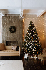 Stylish interior of living room with decorated Christmas tree
