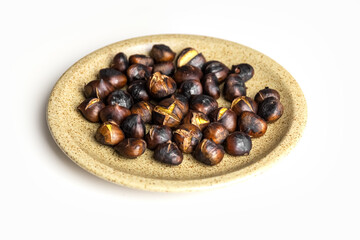 Roasted chestnuts on a grater. Delicious and healthy food. Isolate. Photo