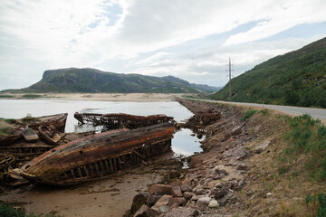 Fototapeta na wymiar The graveyard of ships in the village of Teriberka, Murmansk region.
