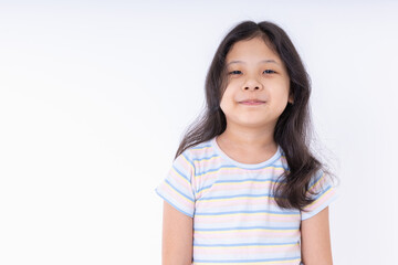 Portrait close-up kid girl she very nice looking, smiling cheery, smart, and confident. Asian kid girl standing smile happy isolated on white background with copy space.