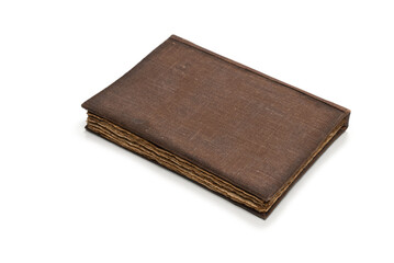 An old brown book isolated on white background.