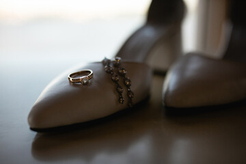 Wedding rings in the composition, wedding day celebration, wedding details in a beautiful...
