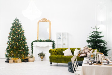 Decorated festive table. Christmas decorations for home in the living room or dining room