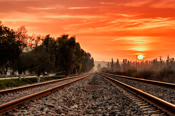 Fototapeta premium railway in the sunset