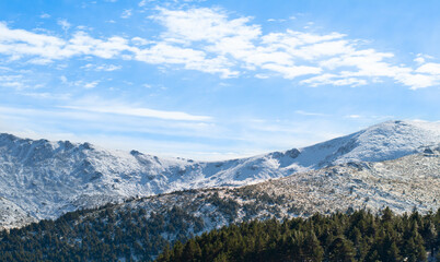 Fototapeta na wymiar Panoramic view of mountains with snow in winter