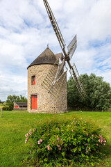 Plakat Cherrueix, France.26-23-2021. Old windmill near the ocean at Cherrueix in Brittany. France.