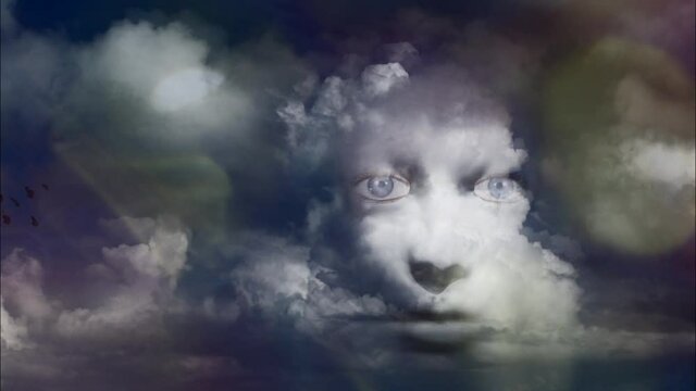 Mystic woman's face in clouds