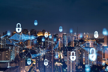 Glowing padlock hologram, night panoramic city view of Kuala Lumpur, Malaysia, Asia. The concept of cyber security shields to protect KL companies. Double exposure.