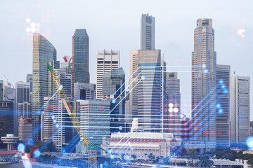 Technology hologram over panorama city view of Singapore. The largest tech hub in Asia. The concept of developing coding and high-tech science. Double exposure.