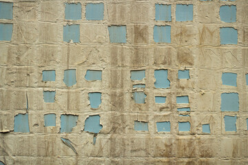 Tile texture. Old wall. Details of Soviet architecture. Squares of tiles.