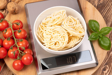 Bowl of pasta on the kitchen scales