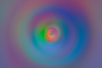 Shape circular, spiral, defocused, multicolored with soft colors. In the center the colors are stronger and less soft.