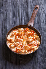 prawns cooked in rich, creamy Alfredo sauce