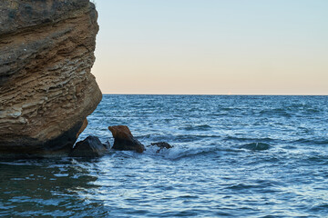 Sunset on the beach summertime blue stones