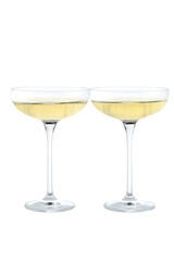 Two champagne coupe isolated on white background.Two glasses of champagne isolated on white background.