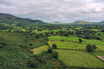 Fototapeta na wymiar aerial view cloudy summer countryside,newry,Northern Ireland