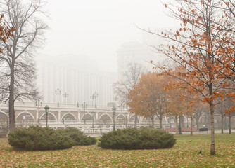 Moscow, Russia. Heavy fog.  November.  Alexander garden near the Kremlin. View to Manezhnaya square