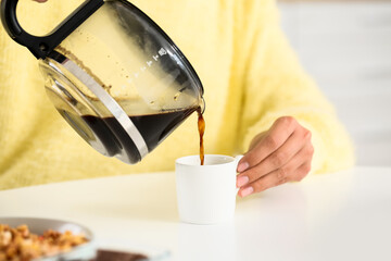 Morning of beautiful woman drinking coffee at home, closeup