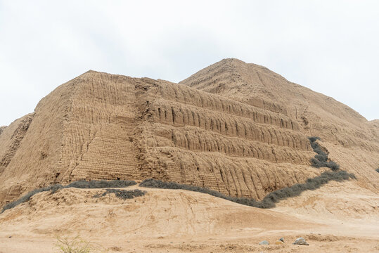 Sun pyramid (Huaca del sol) in adobe bricks near Trujillo, Peru.
