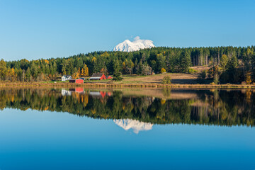 Mount Rainier-Landscape of Rapjohn Lake with Red Barns and Mount Rainier Reflected in the Glassy Lake