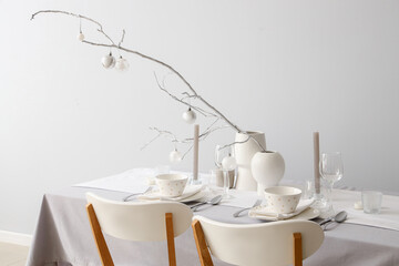 Elegant Christmas table setting on light background