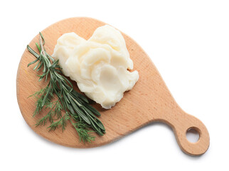 Board with lard and herbs on white background