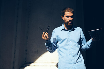 funny business man with a tablet in his hands internet