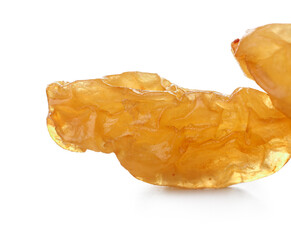 Tasty raisins on white background, closeup