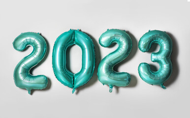 Figure 2023 made of color balloons on light background