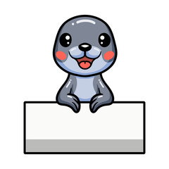 Cute little seal cartoon with blank sign