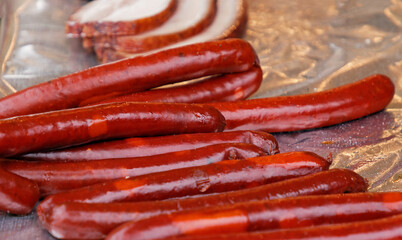 Grilled hot sausages sold on market