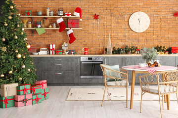 Interior of beautiful modern kitchen with Christmas decor